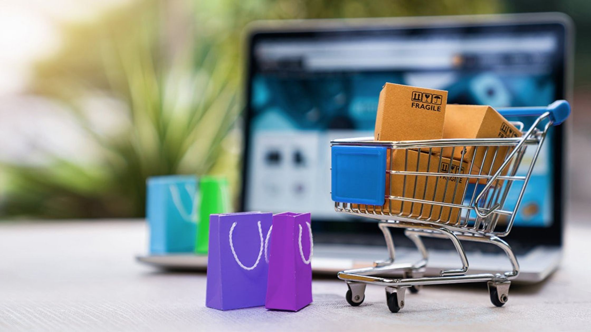 Gift bags and boxes and blurred Background Laptop